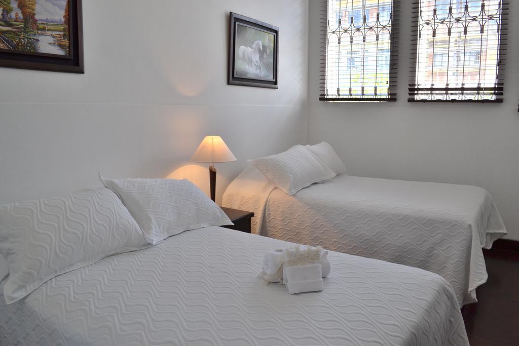 Hotel Estadio 63C Богота Номер фото
