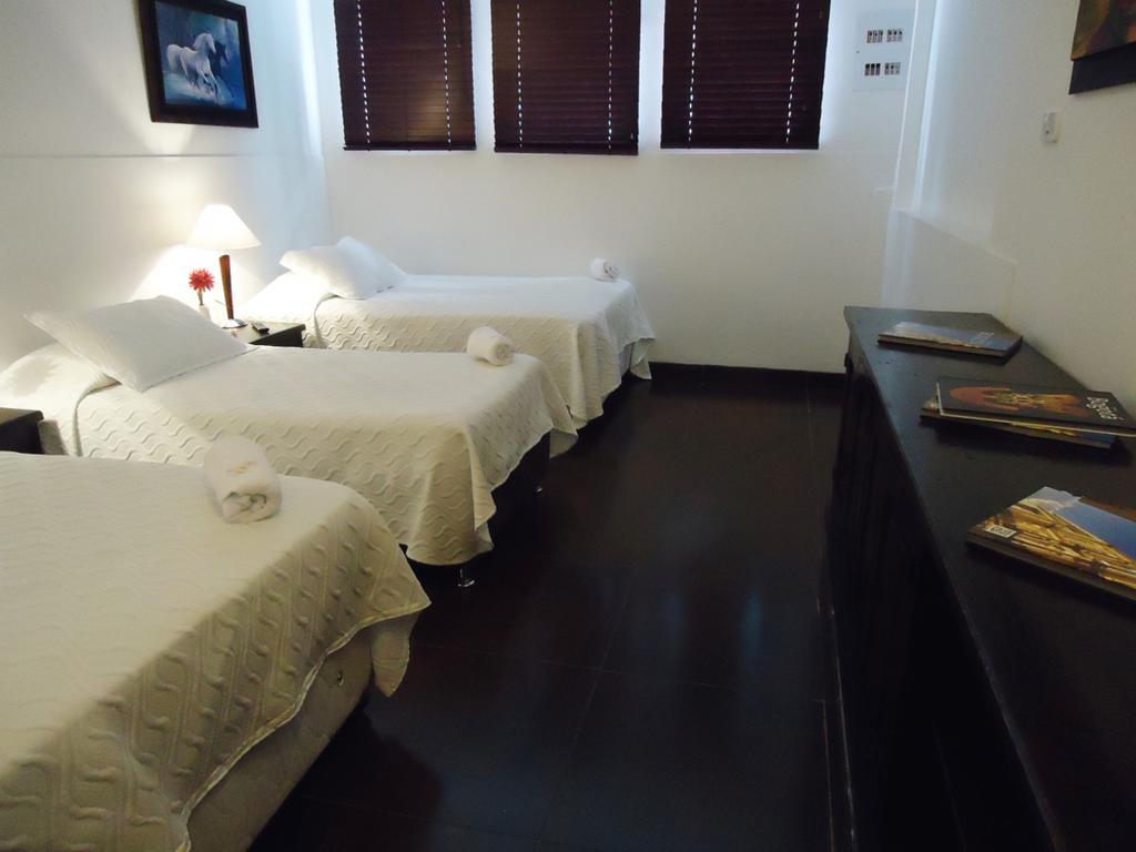 Hotel Estadio 63C Богота Номер фото